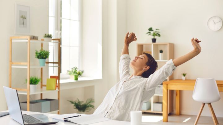 Desk stretches can help improve posture, reduce muscle tension, and increase blood flow. Take deep breaths and stop if you feel any pain.